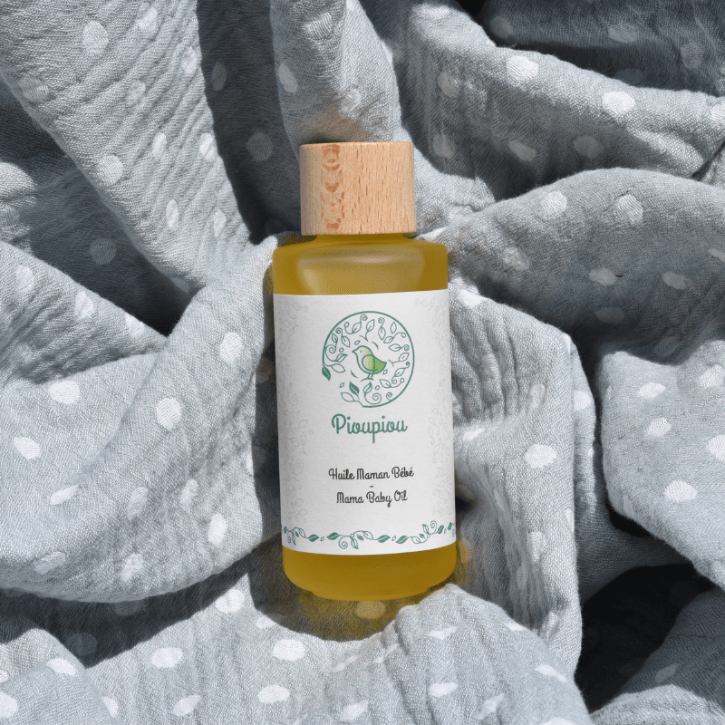 Huile massage bébé naturelle - Actifs doux pour peaux sensibles fabriquée en Suisse